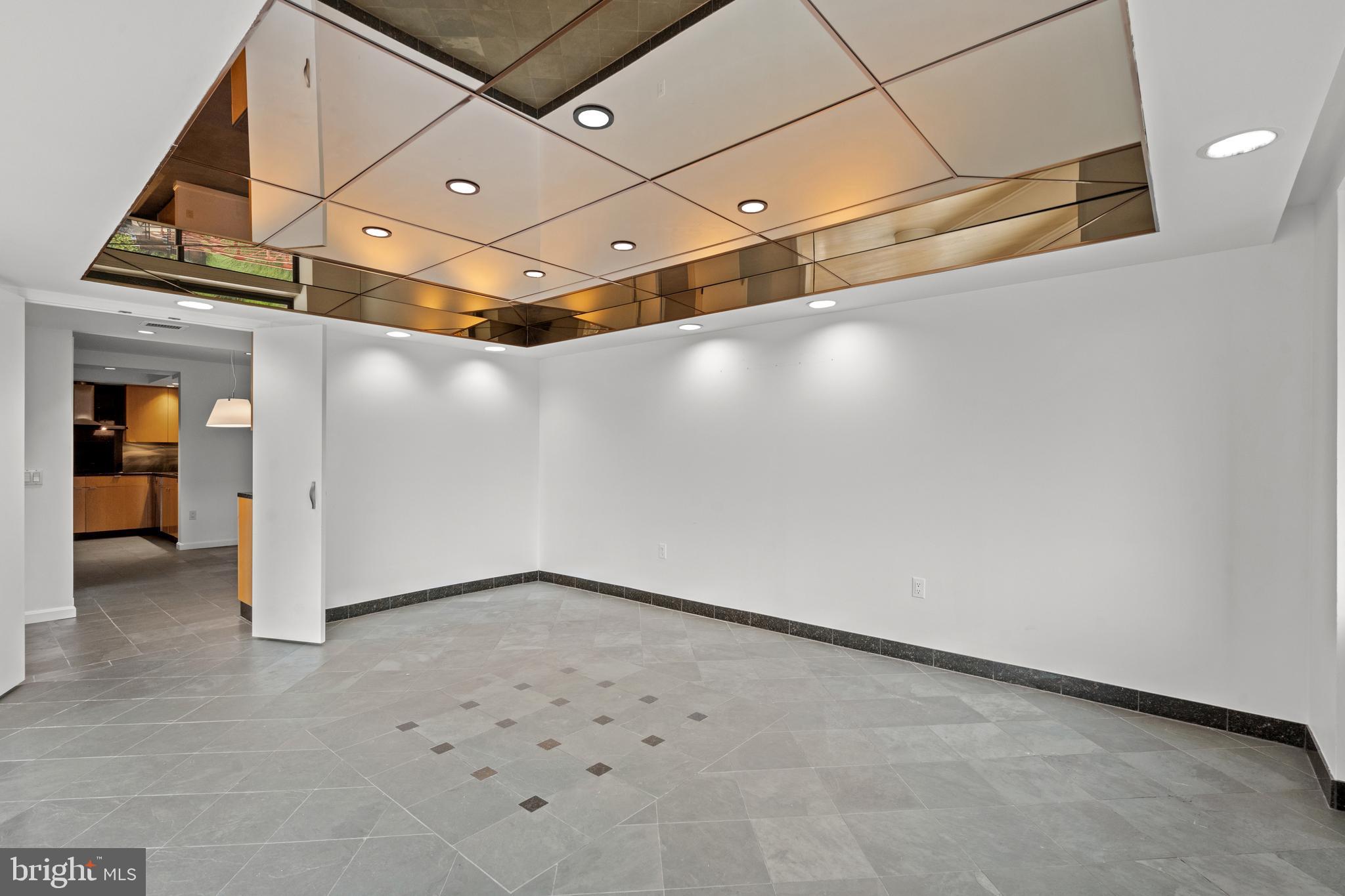 1015 33rd Street Northwest, Unit 702 Washington, DC 20007 - Photo 14 of 31 Dining Room with Mirrored Ceiling