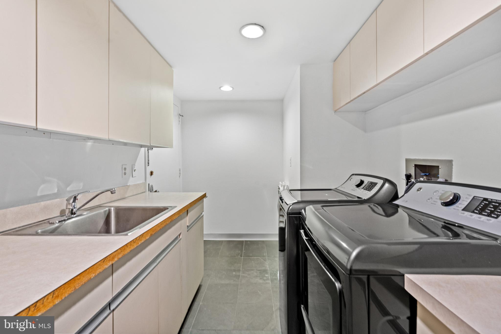 1015 33rd Street Northwest, Unit 702 Washington, DC 20007 - Photo 30 of 31 Laundry Room off Kitchen