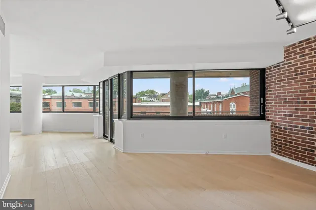 an empty room with windows