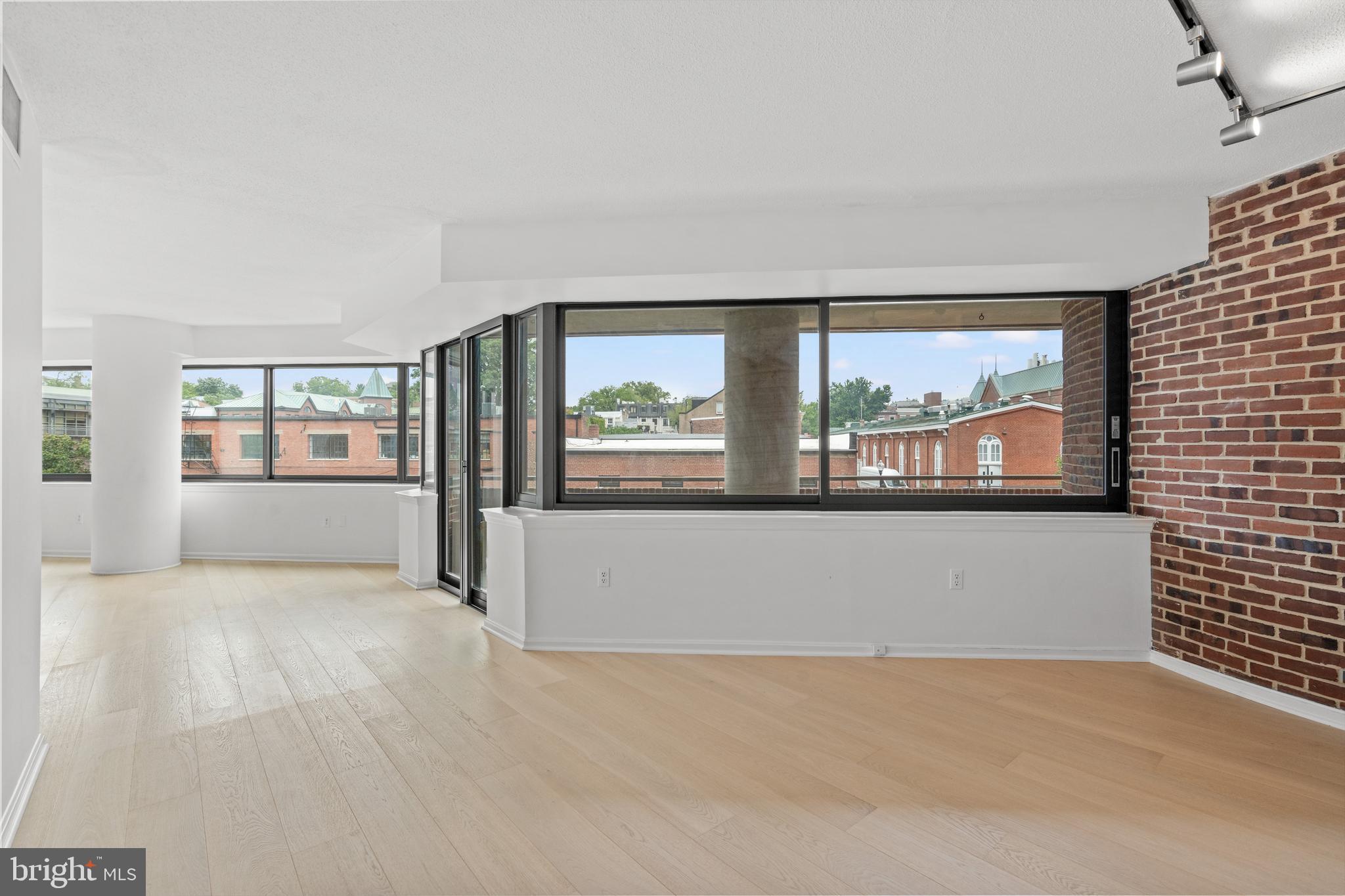 1015 33rd Street Northwest, Unit 702 Washington, DC 20007 - Photo 8 of 31 View from Library to Living Room