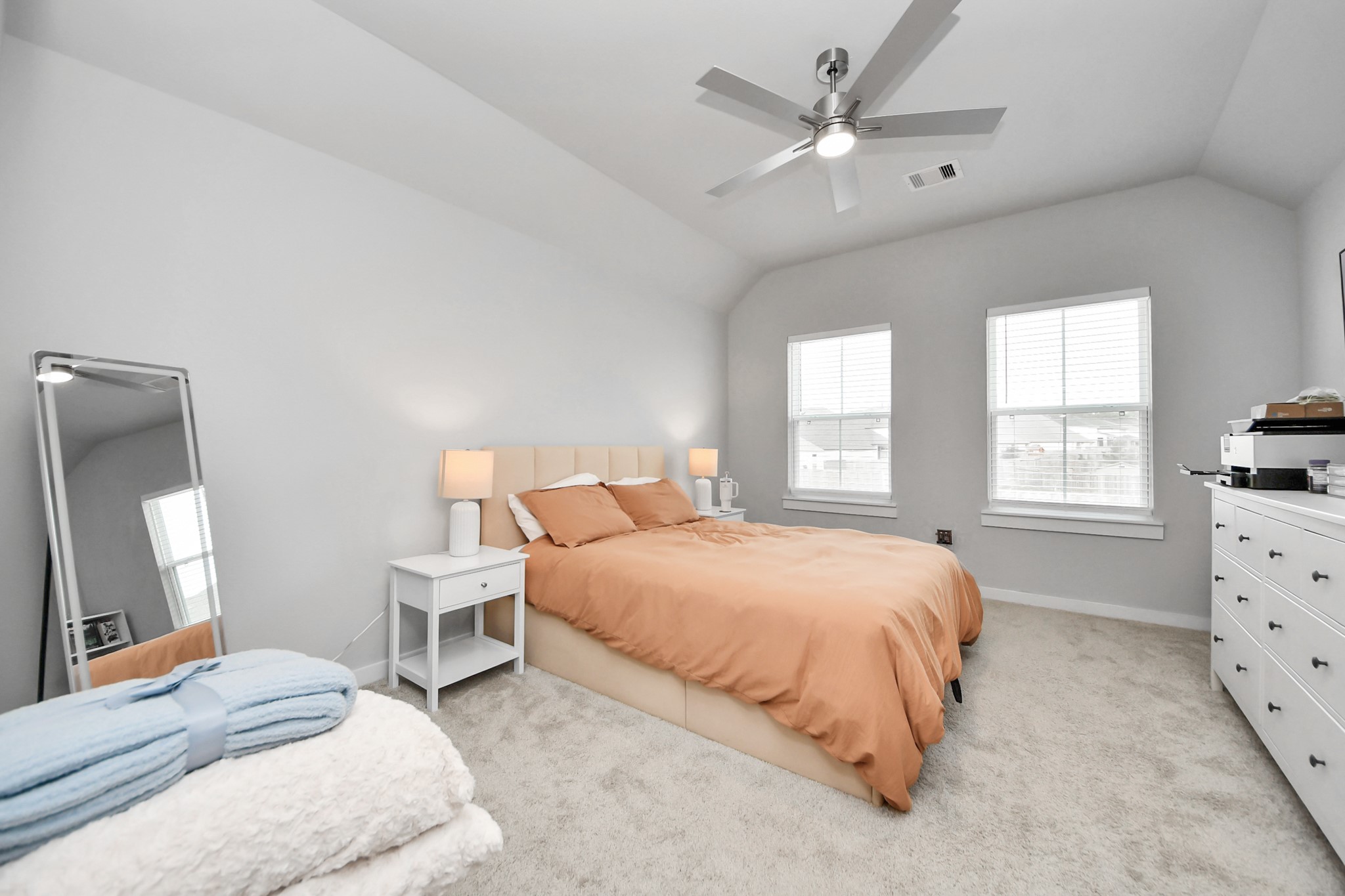 1920 Golden Spruce Lane Conroe, TX 77301 - Photo 22 of 28 a bedroom with a bed a window and dresser