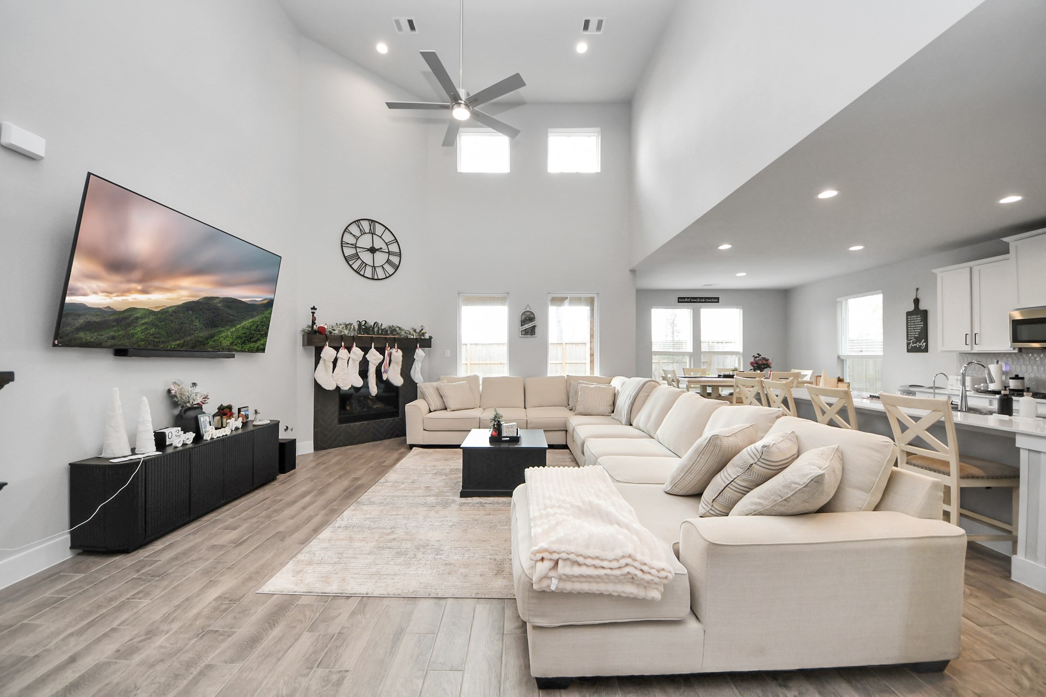1920 Golden Spruce Lane Conroe, TX 77301 - Photo 7 of 28 a living room with furniture and a flat screen tv