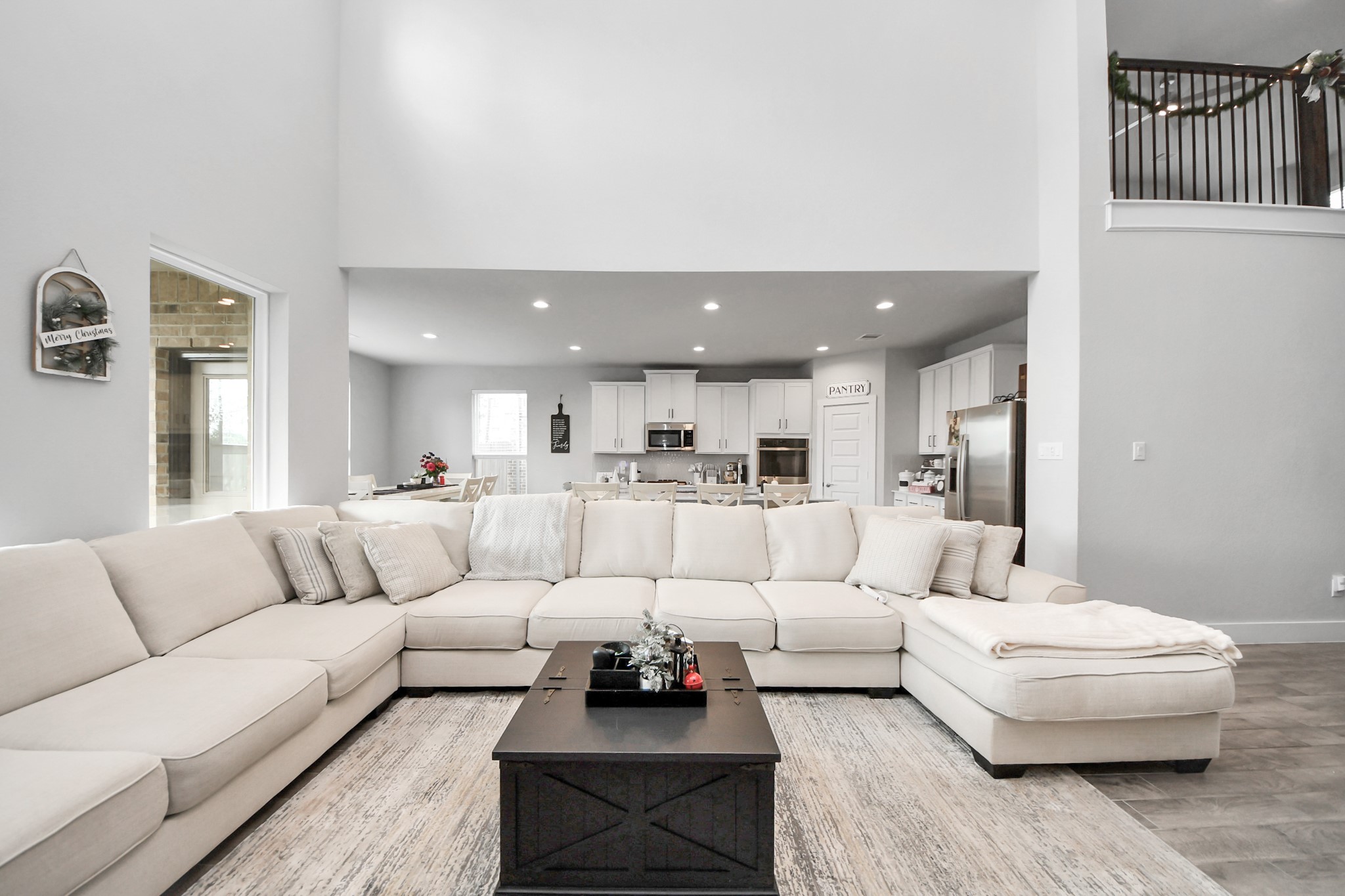 1920 Golden Spruce Lane Conroe, TX 77301 - Photo 10 of 28 a living room with furniture and a large mirror