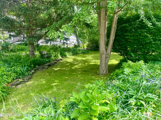 a view of backyard with green space