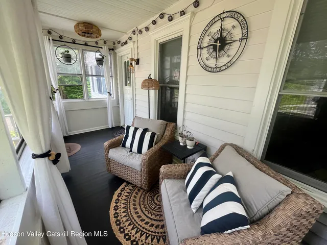 a view of living room kitchen and a window