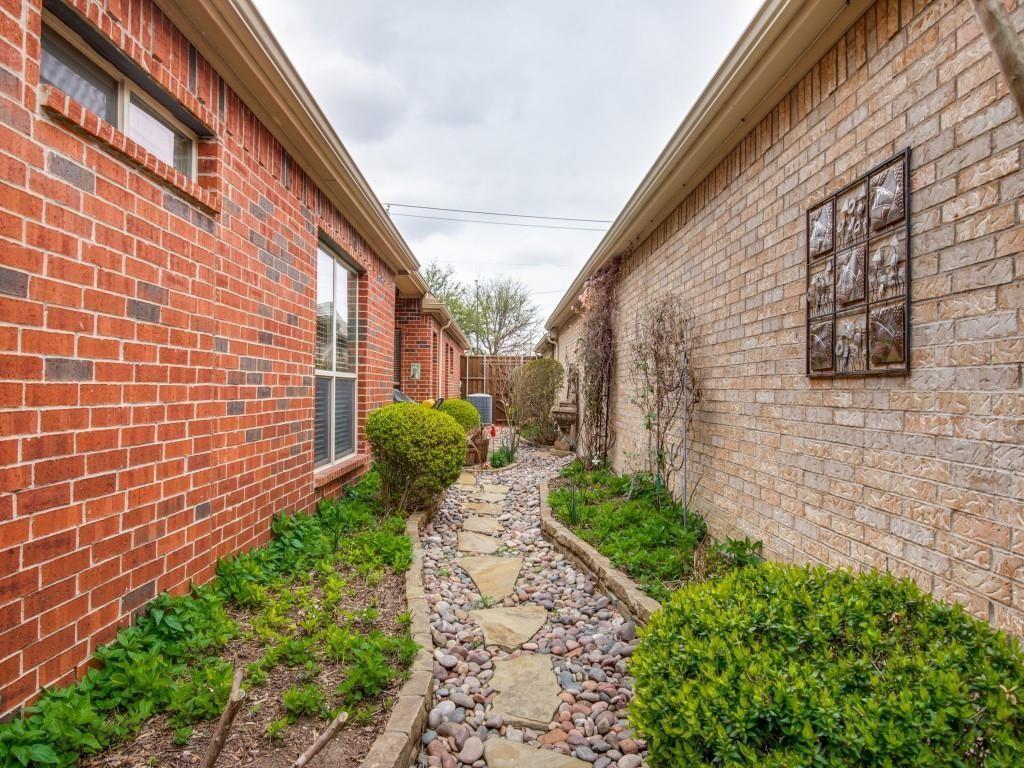 9962 Bell Rock Road Frisco, TX 75035 - Photo 28 of 28 a pathway of a house with a yard