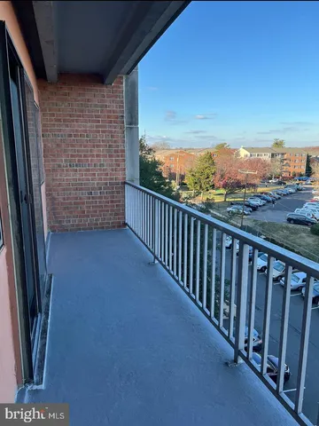 a view of a balcony with an outdoor space