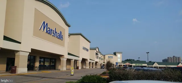 a view of a cafe with sitting area