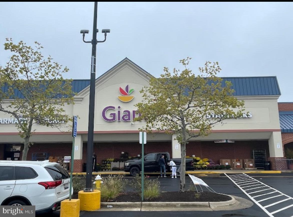 431 North Armistead Street, Unit 502 Alexandria, VA 22312 - Photo 24 of 24 a view of a cafe with sitting area