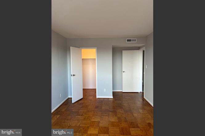 431 North Armistead Street, Unit 502 Alexandria, VA 22312 - Photo 5 of 24 a view of a room with a hallway