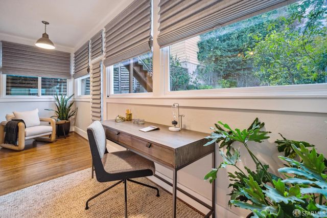 a garden view with a seating space