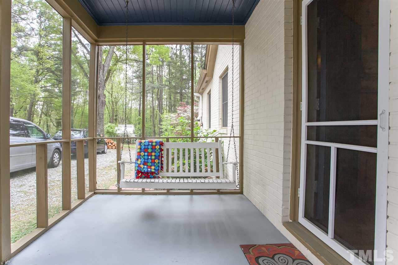 2509 Pickett Road Durham, NC 27705 - Photo 20 of 25 a view of a porch with wooden floor and outdoor space