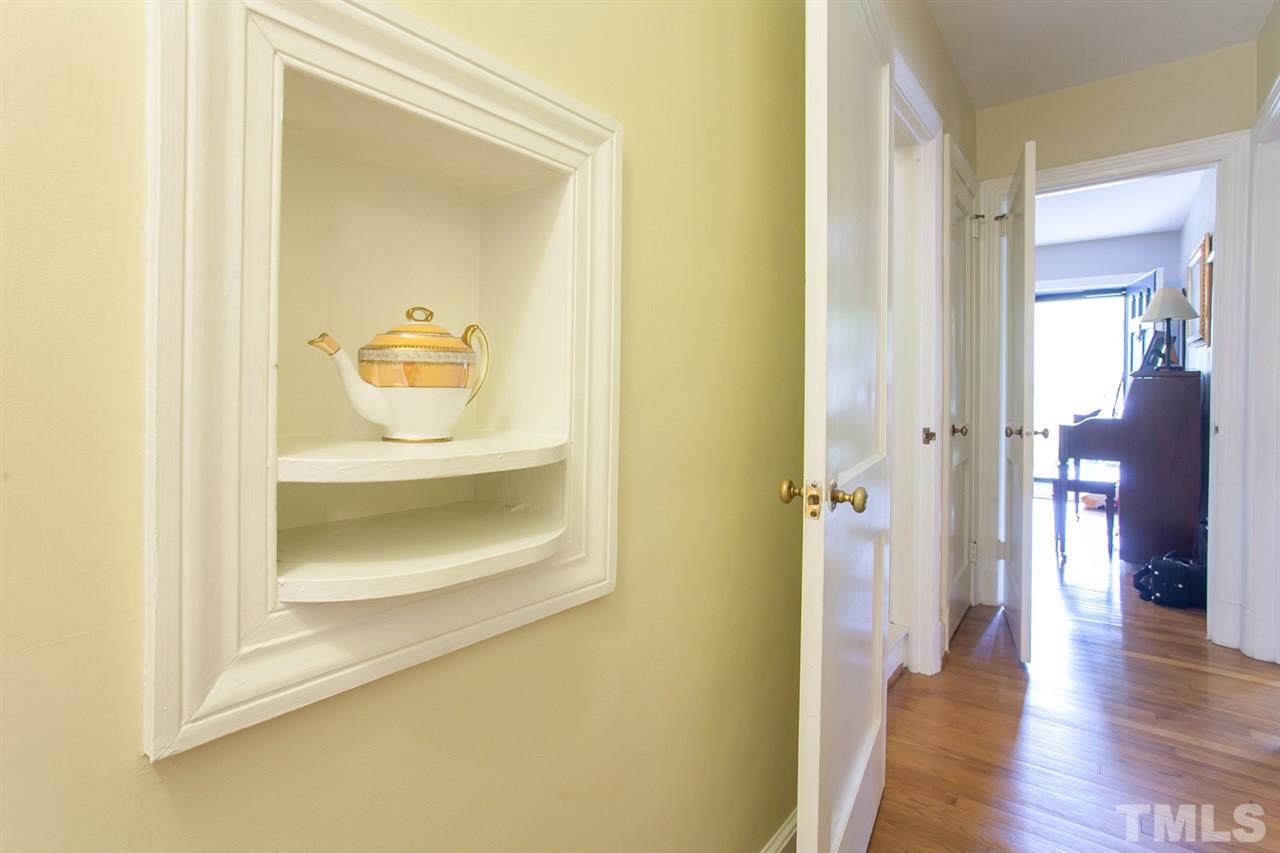 2509 Pickett Road Durham, NC 27705 - Photo 10 of 25 a view of a hallway with wooden floor