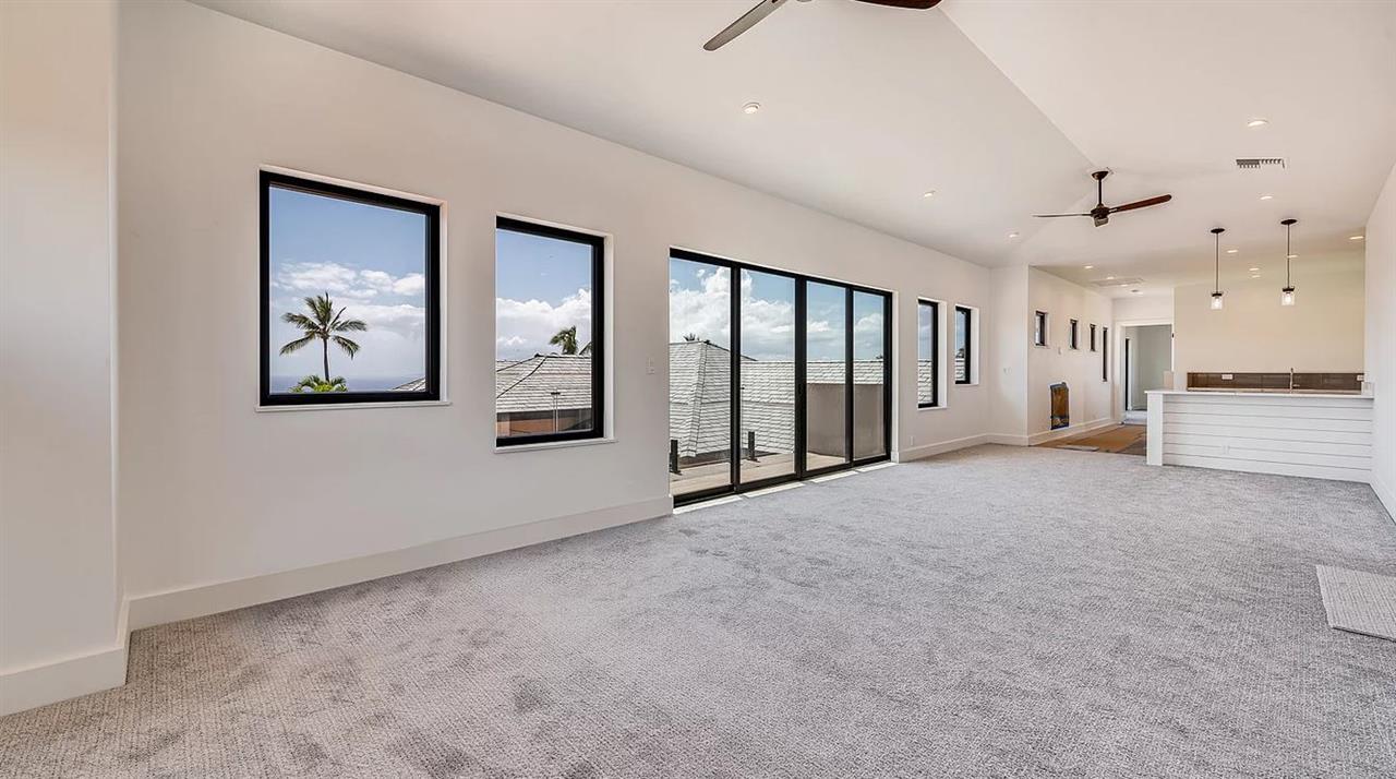 804 Anapuni Loop, Unit 63 Lahaina, HI 96761 - Photo 14 of 30 a view of a hallway with entryway and chandelier
