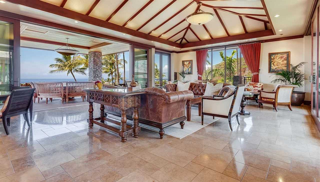 804 Anapuni Loop, Unit 63 Lahaina, HI 96761 - Photo 26 of 30 a living room with furniture and a large window
