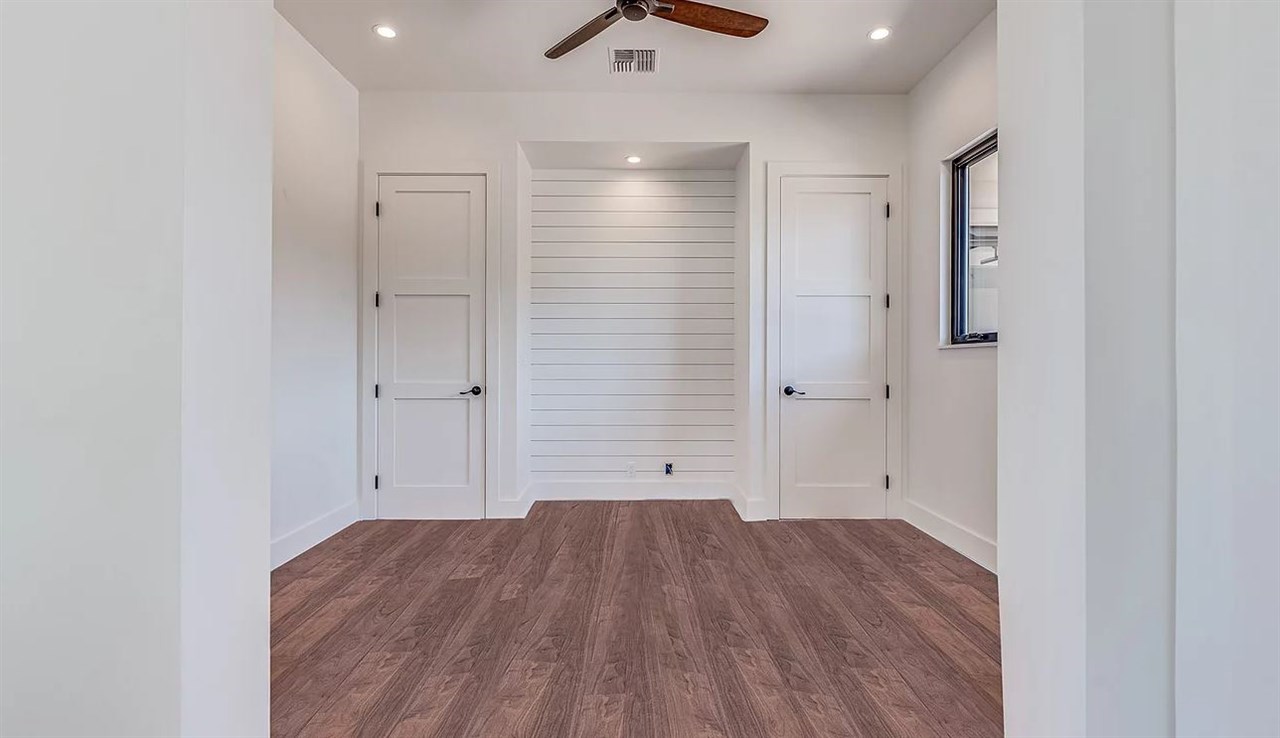 804 Anapuni Loop, Unit 63 Lahaina, HI 96761 - Photo 10 of 30 wooden floor in an empty room