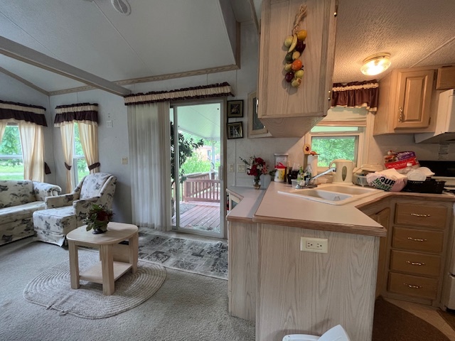 2795 East 28th Road Marseilles, IL 61341 - Photo 11 of 64 a kitchen with stainless steel appliances kitchen island granite countertop a sink and a refrigerator