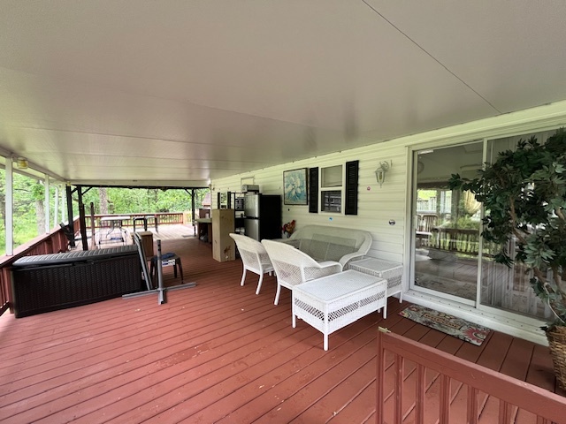 2795 East 28th Road Marseilles, IL 61341 - Photo 26 of 64 a outdoor space with a large window and furniture
