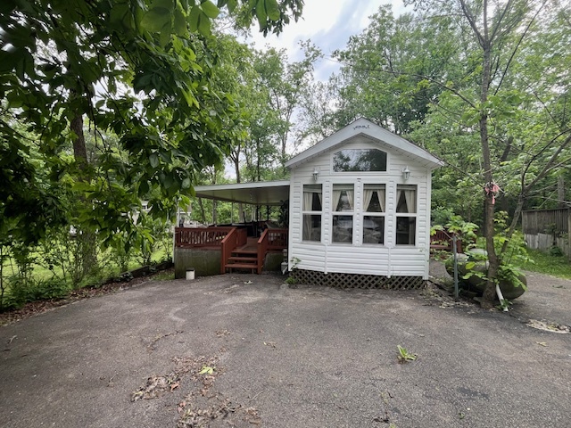 2795 East 28th Road Marseilles, IL 61341 - Photo 3 of 64 a front view of a house with a garden
