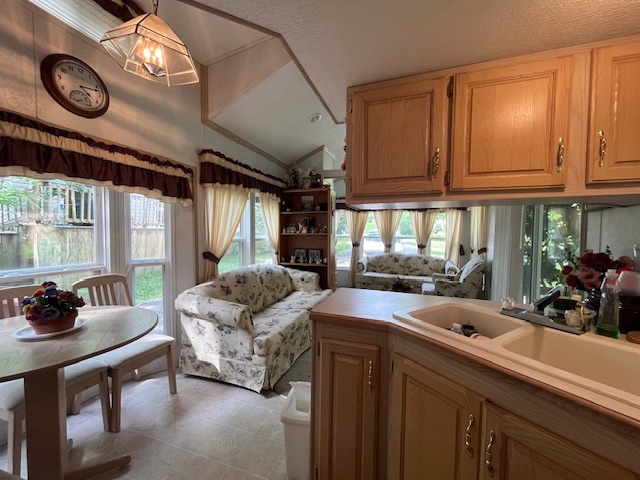 2795 East 28th Road Marseilles, IL 61341 - Photo 9 of 64 a kitchen with stainless steel appliances granite countertop a stove a sink dishwasher and cabinets with wooden floor
