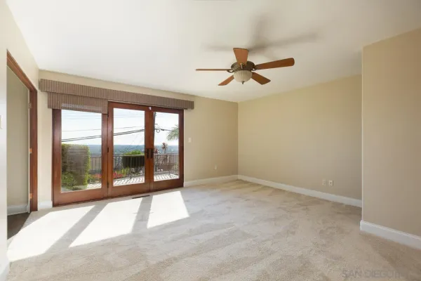 a view of empty room with front door