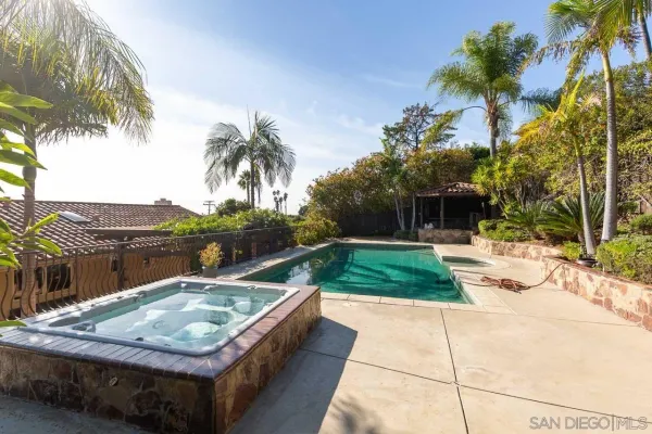 a view of a patio with swimming pool