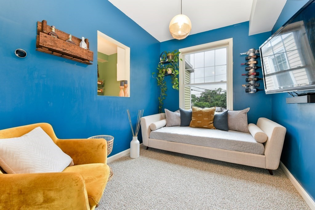 110 Maple Place, Unit 8 Dedham, MA 02026 - Photo 6 of 22 a bedroom with furniture and a window