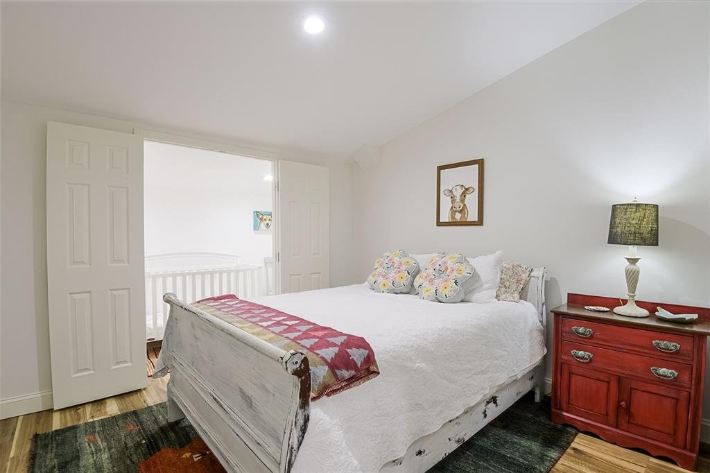 501 A Anderson Rnch Road Waxahachie, TX 75167 - Photo 26 of 36 a bedroom with a bed and a window