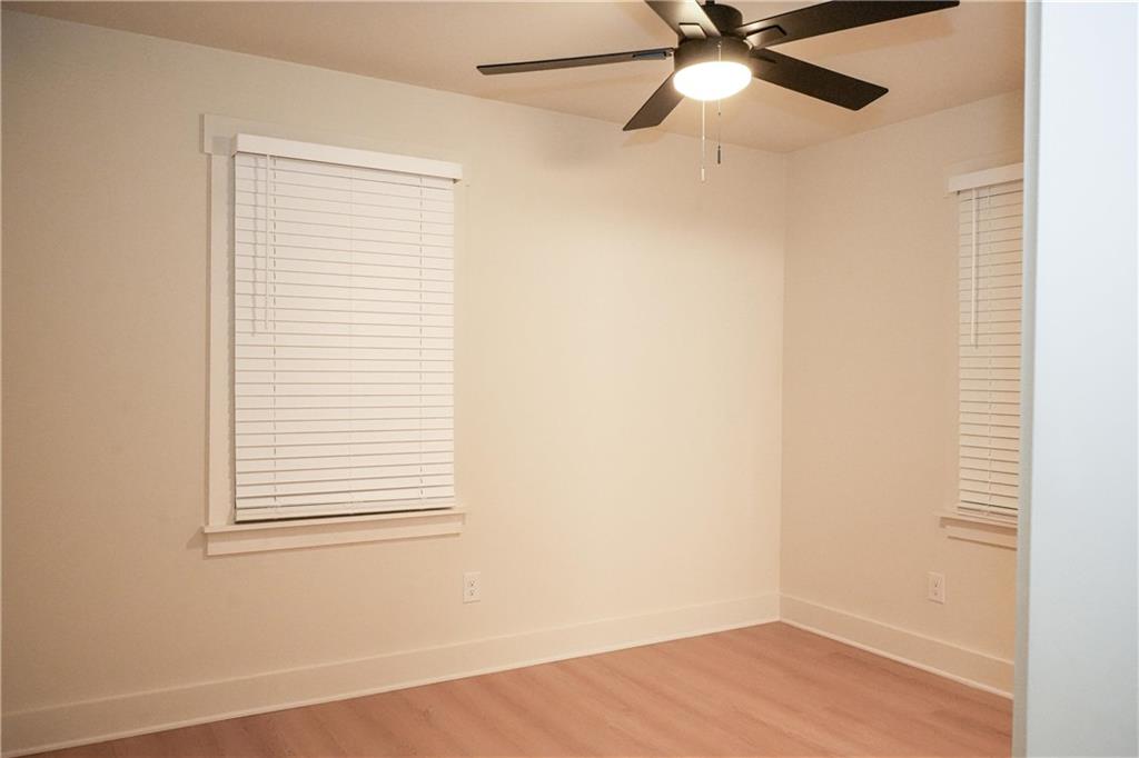 4747 Nelda Drive Austell, GA 30106 - Photo 15 of 23 an empty room with a window and a fan