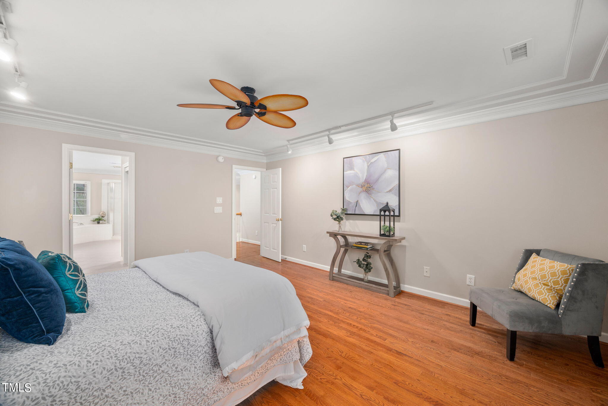 5326 Goldenglow Way Raleigh, NC 27606 - Photo 23 of 41 a bedroom with furniture and wooden floor