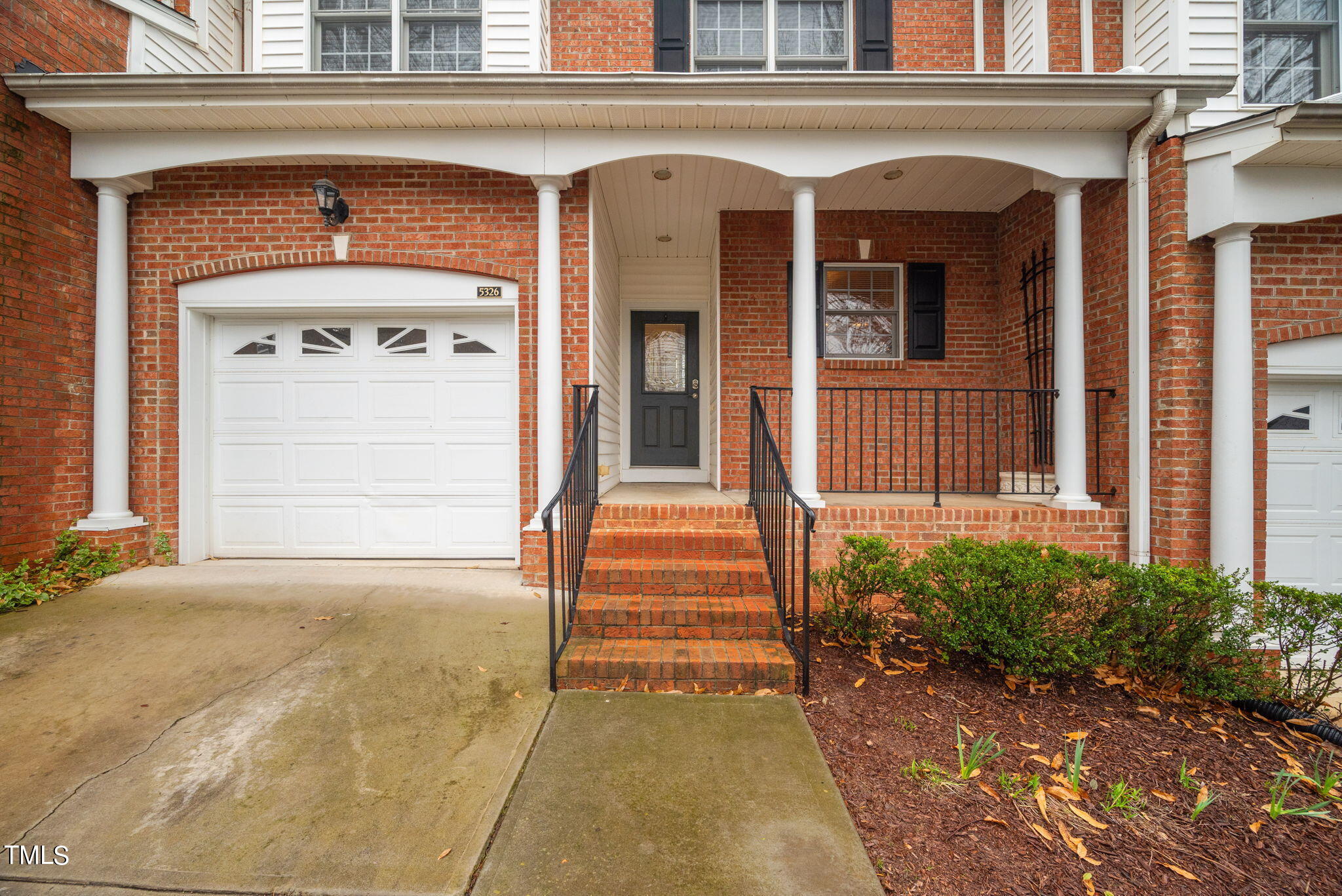 5326 Goldenglow Way Raleigh, NC 27606 - Photo 4 of 41 a front view of a house with a window