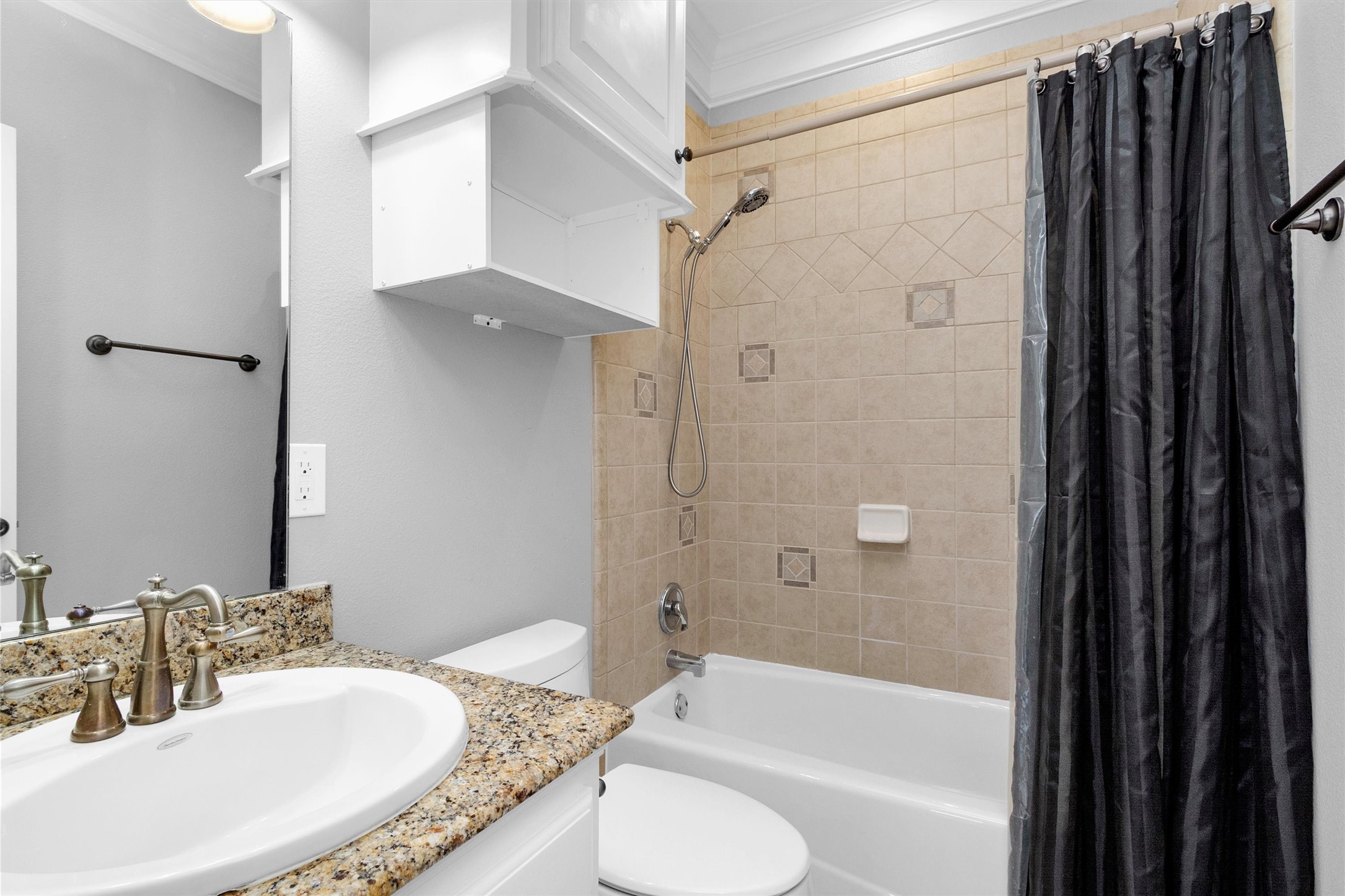 304 Vincent Street Houston, TX 77009 - Photo 18 of 36 a bathroom with a granite countertop sink toilet and shower