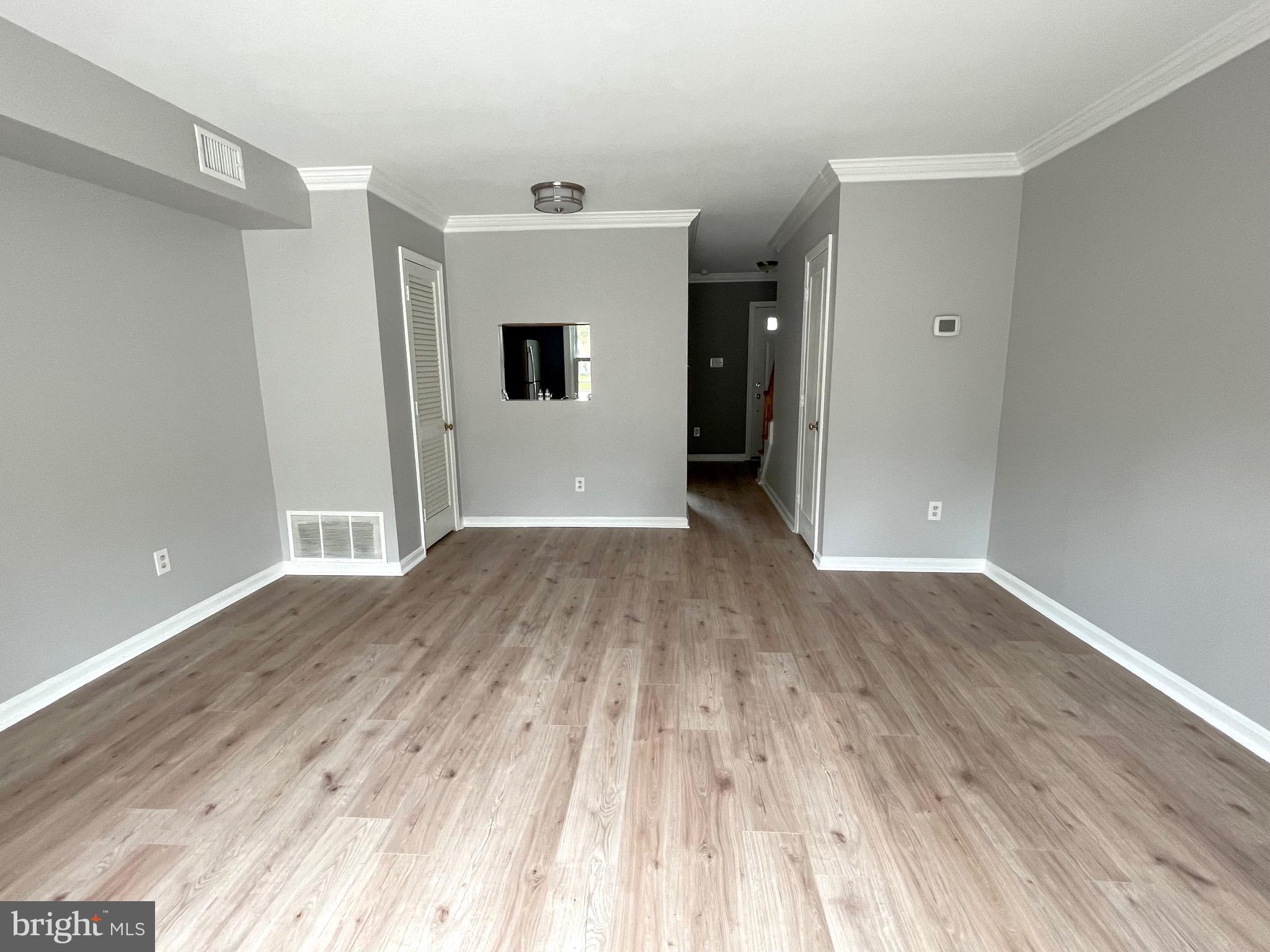 8546 Forrester Boulevard, Unit 880 Springfield, VA 22152 - Photo 5 of 12 ... with engineered hardwood floors