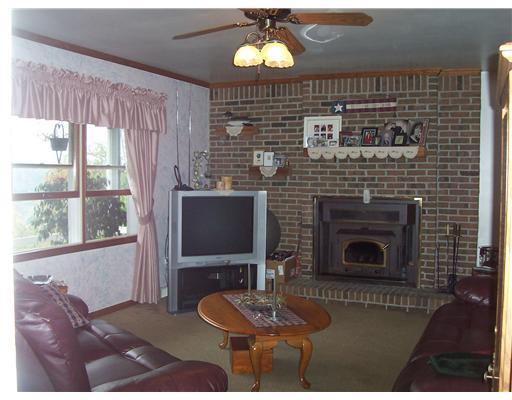 1560 Pine Grove Road Beaver, PA 15009 - Photo 7 of 12 Living Room. Wood Burning Insert in Fireplace
