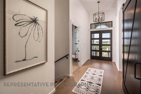 a view of entryway with livingroom