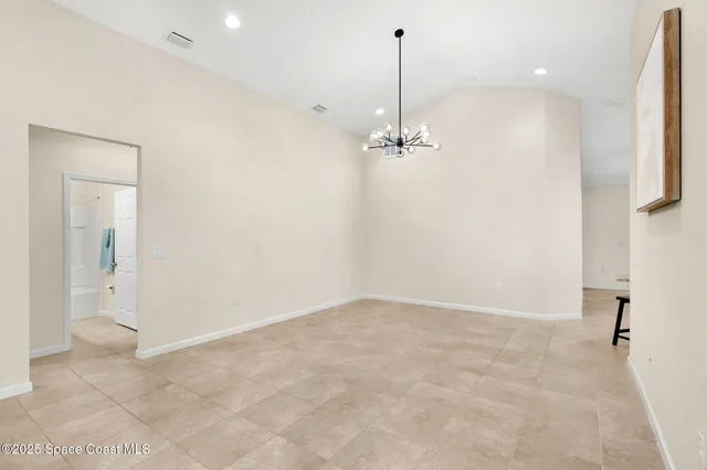 a view of empty room with a sink