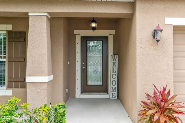 a front view of a house with a entryway
