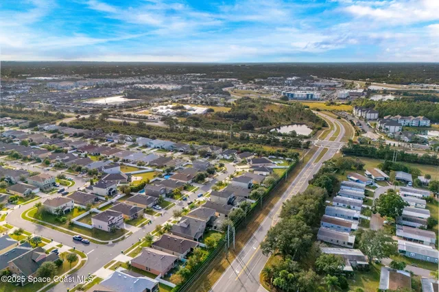 an aerial view of residential building with outdoor space