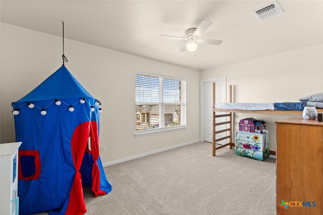 2233 Chia Court Temple, TX 76501 - Photo 24 of 47 a living room with dryer and washer