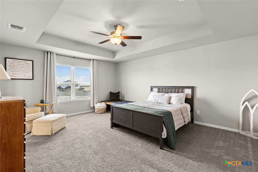 2233 Chia Court Temple, TX 76501 - Photo 31 of 47 a spacious bedroom with a bed couch and window