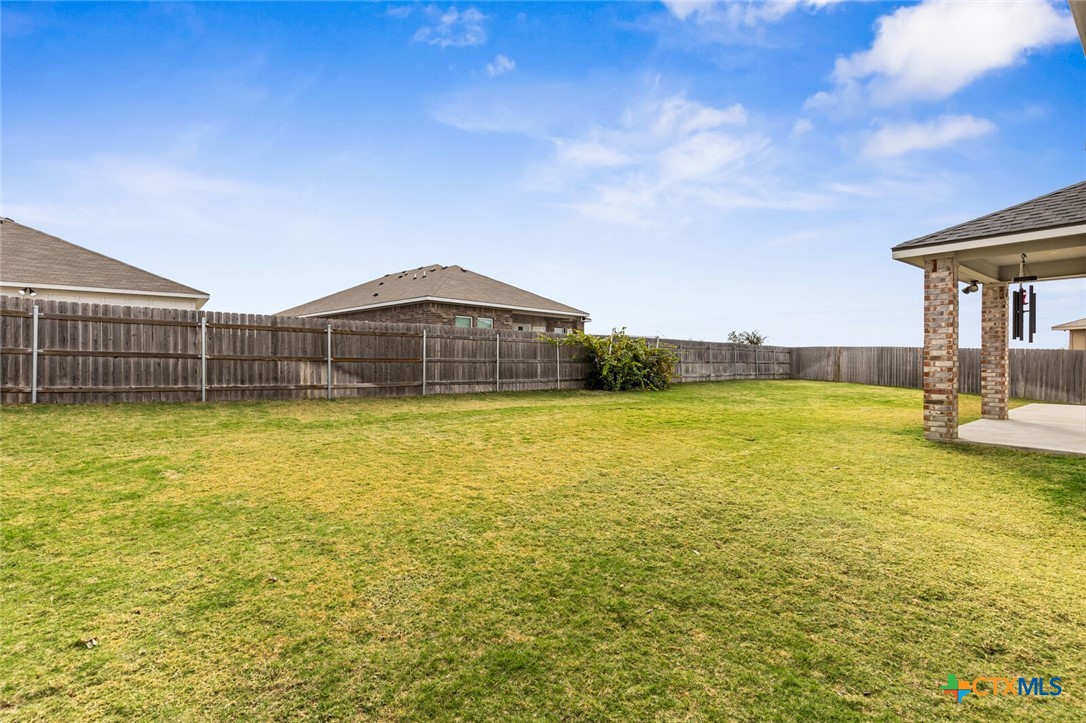 2233 Chia Court Temple, TX 76501 - Photo 45 of 47 a view of a swimming pool with an outdoor space and seating area