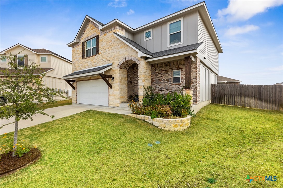 2233 Chia Court Temple, TX 76501 - Photo 5 of 47 a front view of a house with a yard