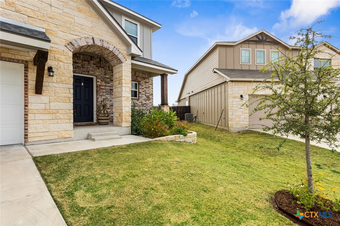 2233 Chia Court Temple, TX 76501 - Photo 6 of 47 a view of a house with a small yard