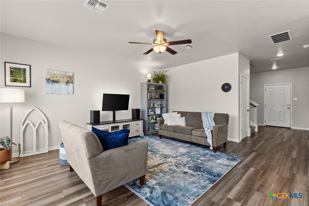 2233 Chia Court Temple, TX 76501 - Photo 10 of 47 a living room with furniture and a flat screen tv