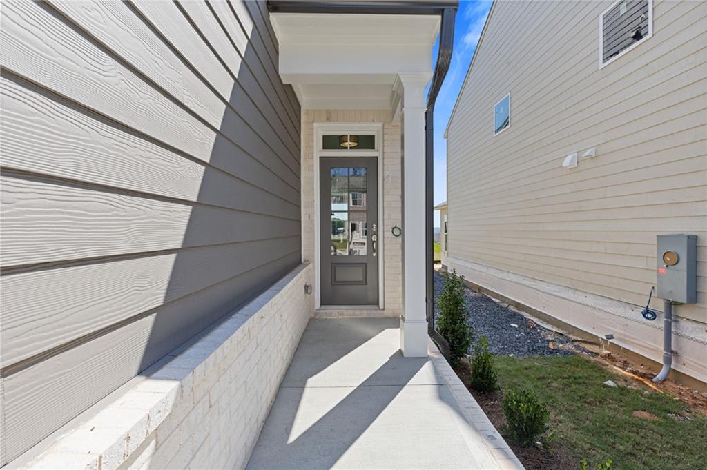 2716 Rylee Carter Street Dacula, GA 30019 - Photo 2 of 24 a view of a porch