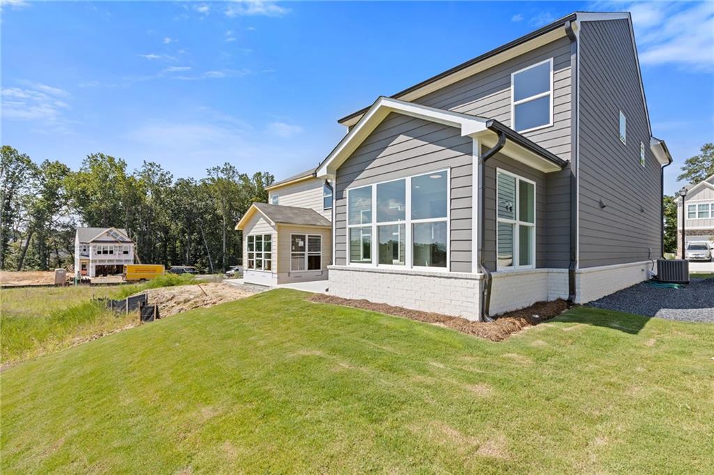 2716 Rylee Carter Street Dacula, GA 30019 - Photo 21 of 24 a view of house with swimming pool and porch