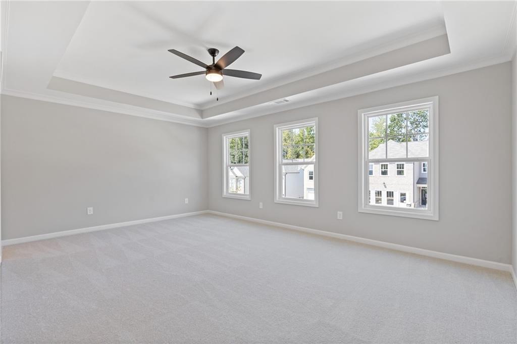 2716 Rylee Carter Street Dacula, GA 30019 - Photo 10 of 24 a view of an empty room with a window