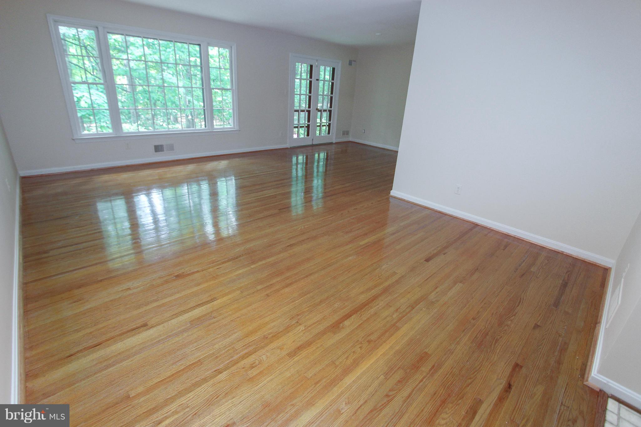 2404 Paddock Lane Reston, VA 20191 - Photo 3 of 30 Living Room w refinished hardwoods