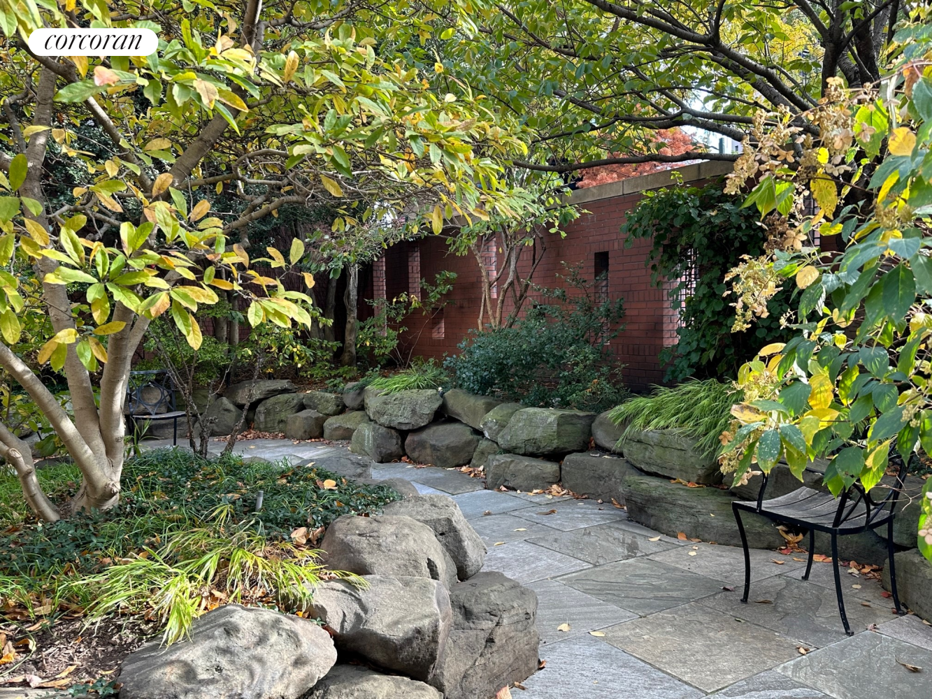 85 Adams Street, Unit 14C Brooklyn, NY 11201 - Photo 11 of 12 a backyard of a house with lots of green space