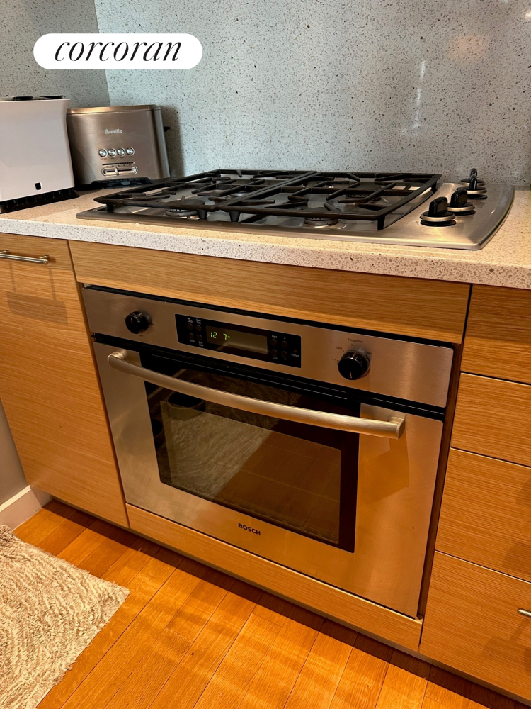 85 Adams Street, Unit 14C Brooklyn, NY 11201 - Photo 4 of 12 a close view of stove top oven